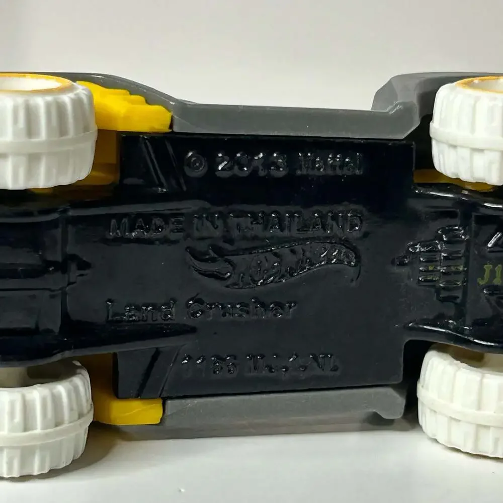 Hot Wheels Land Crusher #8 Snow Stormers Gray and Yellow Diecast Car